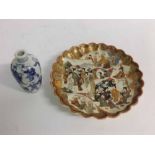 Small Satsuma scalloped dish with figure painted centre and gilded border with impressed mark to