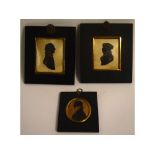 Group of three 19th century silhouettes, male and female profiles, assorted sizes (3)