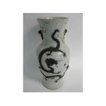 Chinese crackle glazed vase with raised relief of a dragon with period staple repairs and