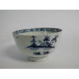 18th century English tea bowl decorated with a dolls house type pattern (hairline crack)