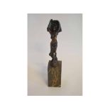 Art Deco style figurine signed "Milo" on a marble stand, 36cms high