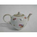 Late 19th/early 20th century Meissen tea pot, decorated with floral sprays and gilt detailing,