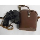 Leather cased pair of Tecnar 20x50 binoculars