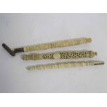 Group of three Victorian ivory hand flag screen handles, one with metal mount, 19cms, 22cms and