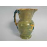 Burgess & Leigh "Burleigh Ware" Art Deco period decorative jug, pale green lustre outer, orange