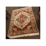 @Modern Heriz rug with cream and rust ground, central geometric lozenge with multi-gulled border,