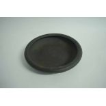Wedgwood black basalt circular bowl of compressed form, 30cms diam