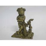 Well modelled Victorian brass model of a young grape harvester on rectangular base, 15cms tall x