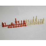 Ivory and red stained part chess set (some losses)