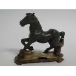20th century soapstone model of a Shire horse on detachable wooden base, overall width 17cms