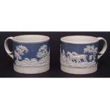 Two mid-19th century Ridgways mugs, the blue ground with sprigged hunting decoration, 8cms high