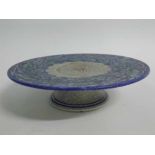 Royal Lancastrian stoneware tazza, hand decorated with blue and green foliate designs to a grey