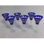 Set of six late 20th century Tudor stemmed cut glass wine glasses, blue flash cut bowls, clear stems