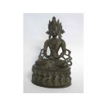 Indian heavy cast bronze figure of a seated Buddha, 38cms tall