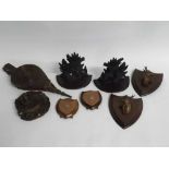 Group of treen items including pair of bellows, pair of gun dog field trial plaques, carved entwined