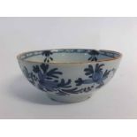 Small 18th/19th century Dutch Delft circular bowl, painted in blue with floral design, 6ins diam (