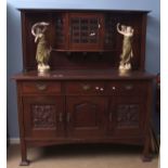Arts & Crafts mahogany side cabinet, the raised back with glazed panel to central cupboard flanked
