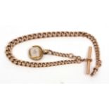 Late 19th century 15ct gold graduated curb link watch chain set with T-bar and swivel, together with