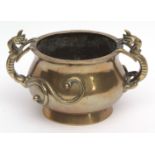 Chinese bronze censer of deep circular form cast and applied with Chilong handles, Xuande mark to