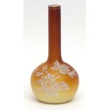 Late 19th century globe and shaft bottle glass vase, satin finished yellow to orange, cased on white