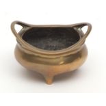 Small Chinese bronze censer with loop handles, Xuande mark to base but probably 19th century, 7cms