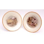 Two Wedgwood pottery plates painted by Emile Lessore with ochre rims, signed and impressed marks and