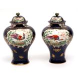 Pair of early 20th century Samson baluster vases and covers, blue scale ground with gilt decoration,