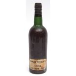 Cockburn's 1963 vintage Port (level upper part of shoulder), one bottle