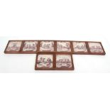 Set of eight 18th century Dutch manganese decorated tiles, religious scenes, currently mounted in