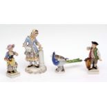 Meissen peacock, and three late 19th century Continental porcelain figures (4)