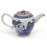 Chinese blue and white porcelain teapot decorated with lakeside temple scenes, 14cms high