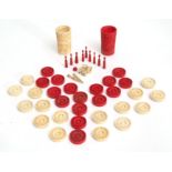 Set of carved and pierced Chinese ivory backgammon counters comprising 16 stained red and 16 white