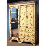 Early 20th century chinoiserie painted wardrobe, with moulded cornice over two panelled doors