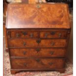 18th century walnut bureau, the fall front enclosing a fitted interior of drawers and pigeonholes
