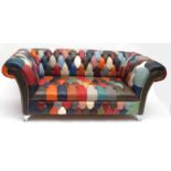 21st century designer Harlequin leather two-seater sofa with multi-coloured upholstery in the