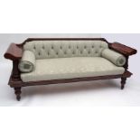 Early 19th century mahogany sofa, the short scroll mounted back joined on either side by shaped
