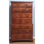 Late 18th century walnut chest on chest, the upper section fitted with three short drawers over