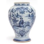 18th century Dutch Delft ware blue and white baluster vase, typically decorated with a Chinoiserie