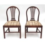 Set of 8 Hepplewhite style mahogany dining chairs, arched backs with pierced splats, plain aprons