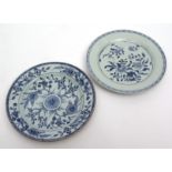 Two Chinese blue and white porcelain dishes decorated with floral sprays, 23cms approx