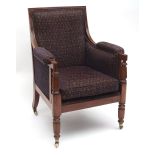 William IV period mahogany library chair, moulded back and sloping arms terminating in reeded