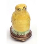 Small South Staffordshire or Battersea enamel bonbonni re, circa 1790 modelled as a canary on oval