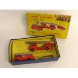 Boxed Dinky Toy gift set, number 957 Fire Service, to include a fire engine with turntable and