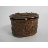 19th century copper and brass Continental casket of oval form with hinged cover and decorated