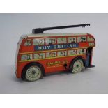 British made tin plate clockwork trolley bus No 804, with Buy British slogan to top, 17cms long (