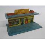 Tin plate Meccano & Co filling and service station, painted in colours, 20cms wide x 10cms tall