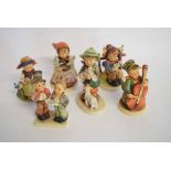 Group of six Hummel Goebel figures to include a young boy with his lambs, a choirboy, a young girl