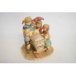 Hummel Goebel figure group, children gathered around a newborn in a crib, 20cms tall