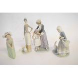 Group of four Lladro figures to include a young girl in a green dress, a further lady with geese