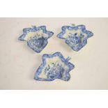 Three 19th century blue and white Spode leaf formed pickle dishes with blue printed centres, with